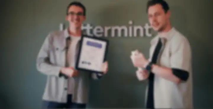 The framed ISO 27001 certificate at the Lettermint office